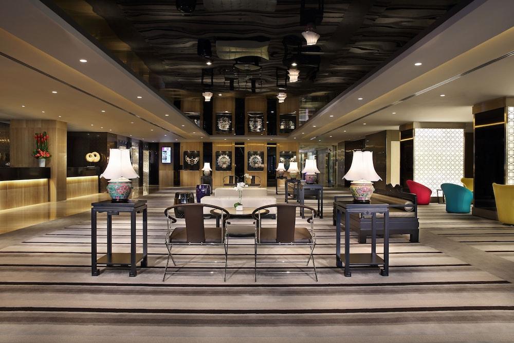 فيليدج هوتل كاتونج باي فار إيست هوسبيتاليتي منطقة الجلوس في الردهة