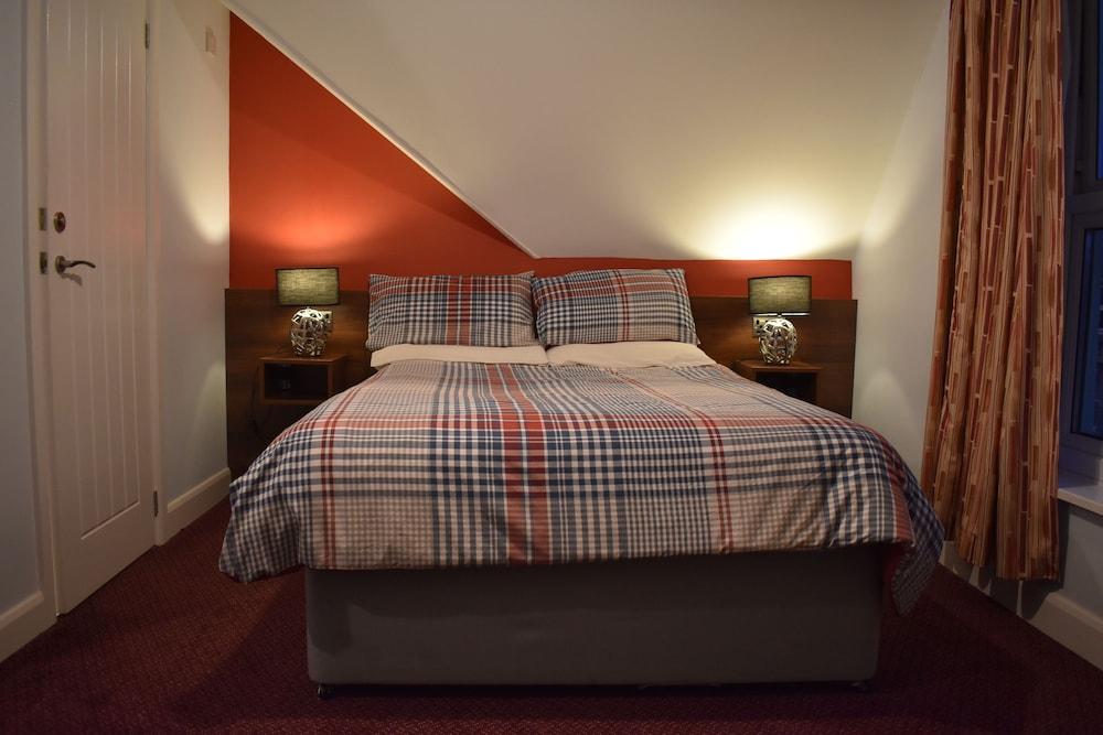 أو واي ٔو أنداون هوتل غرفة