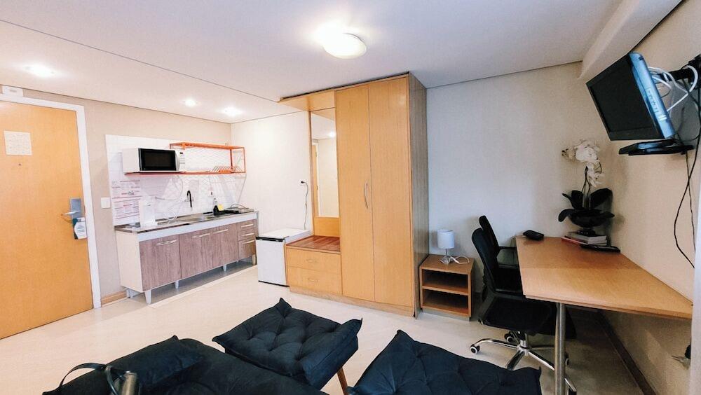 Studio Ibirapuera com piscina Living Area