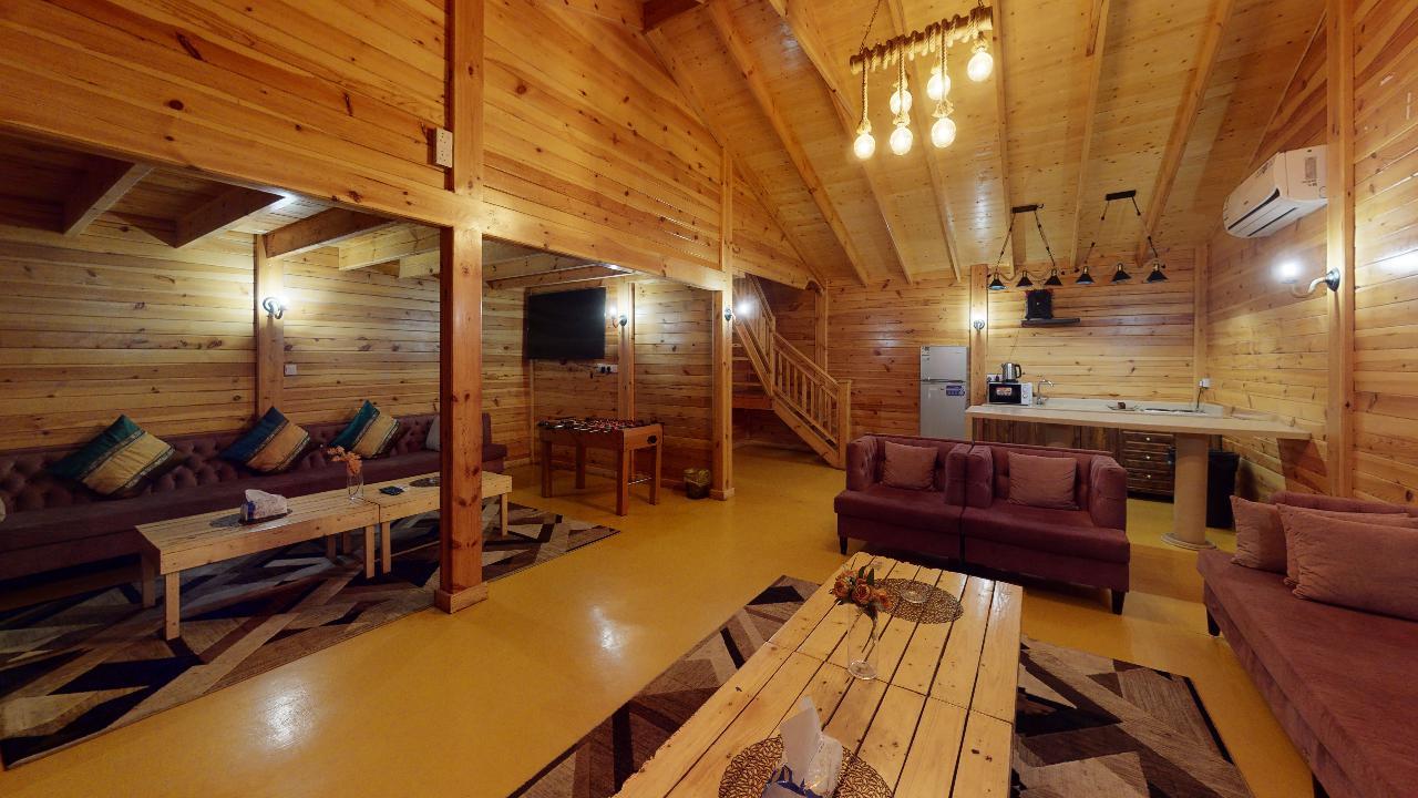 شاليه بتصميم مريح وملعب للأطفال | 619 غرفة معيشة