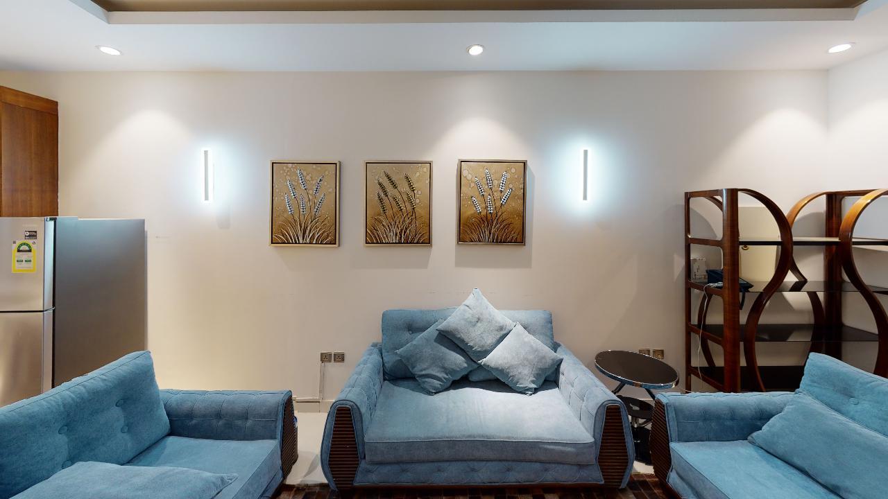 شاليه بتصميم جذاب ومنطقة للشواء | 104 منطقة المعيشة