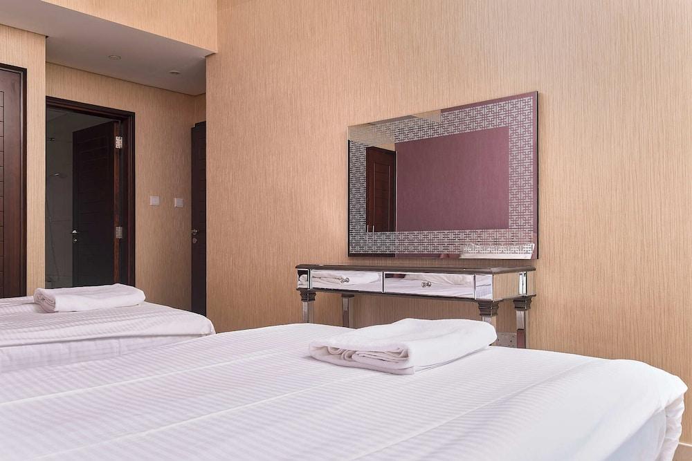 بيلا فيستا -شقة فاخرة بغرفتي نوم بها غرفة للخادمات- بوليفارد سنترال غرفة