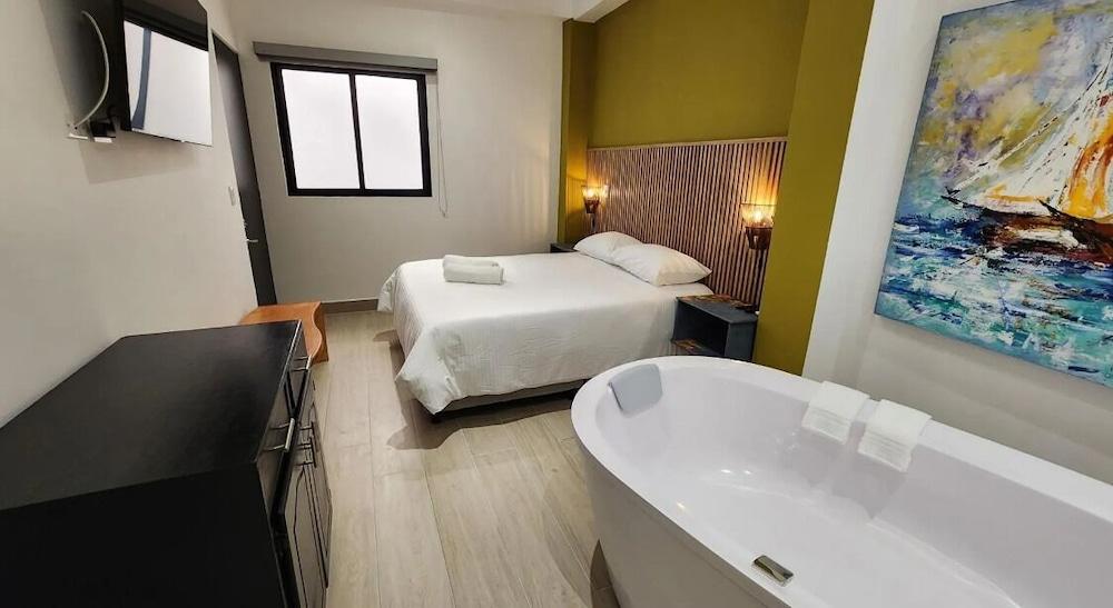 هوتل ماجنيفيك كوليفينج غرفة