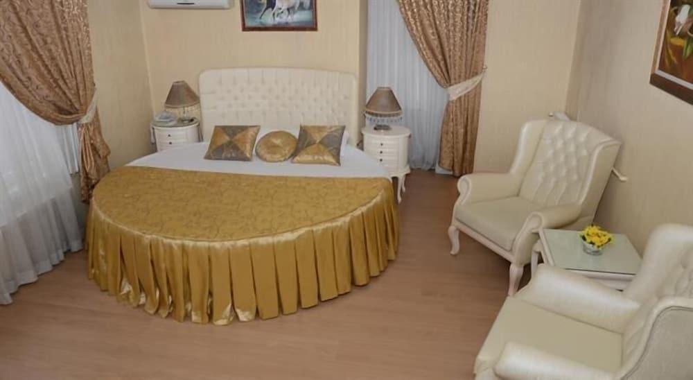 أوميت بيمبي كوسك هوتل غرفة