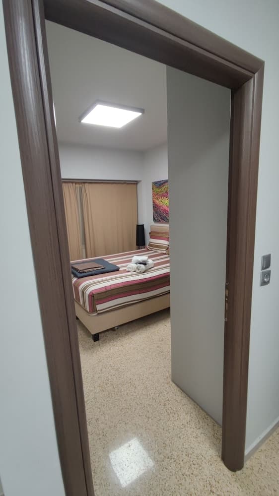 Praxitelous Apartments by Athens Urban Retreat Room