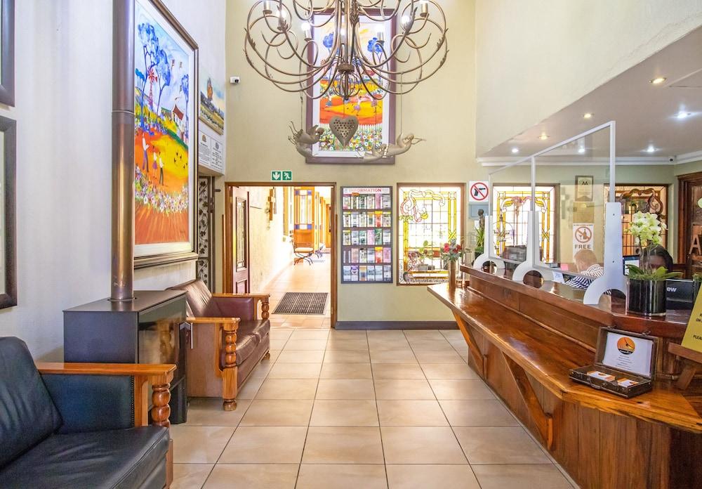 أفريك بوتيك هوتل أو آر تامبو منطقة الاستقبال