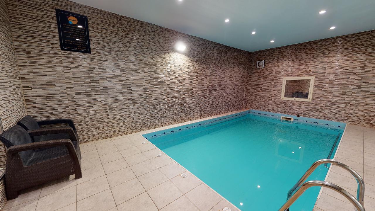 Comfy Chalet with Pool | 1728 Featured Image