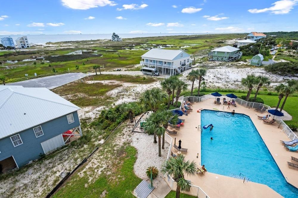 Dunes 502 Condo with Pool and Hot Tub Access Minutes Away from White Sandy Beaches by RedAwning Waterslide