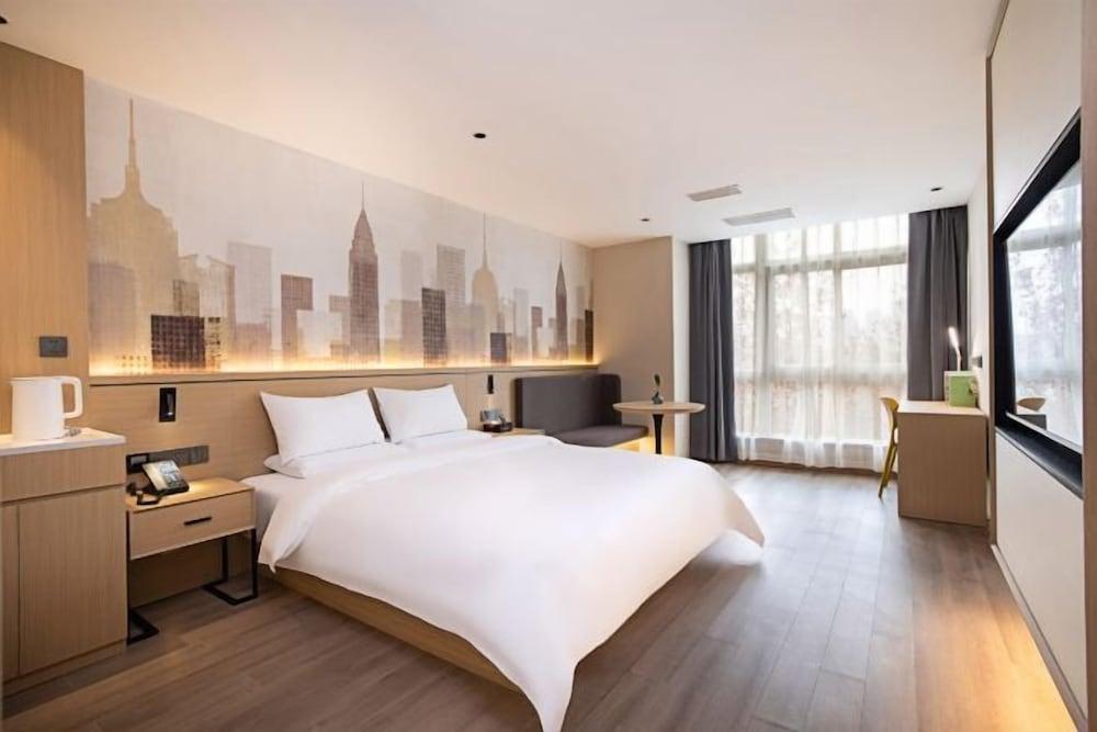 Songguo Hotel (Zhengzhou Tongbai Road Central Hospital Metro Station)