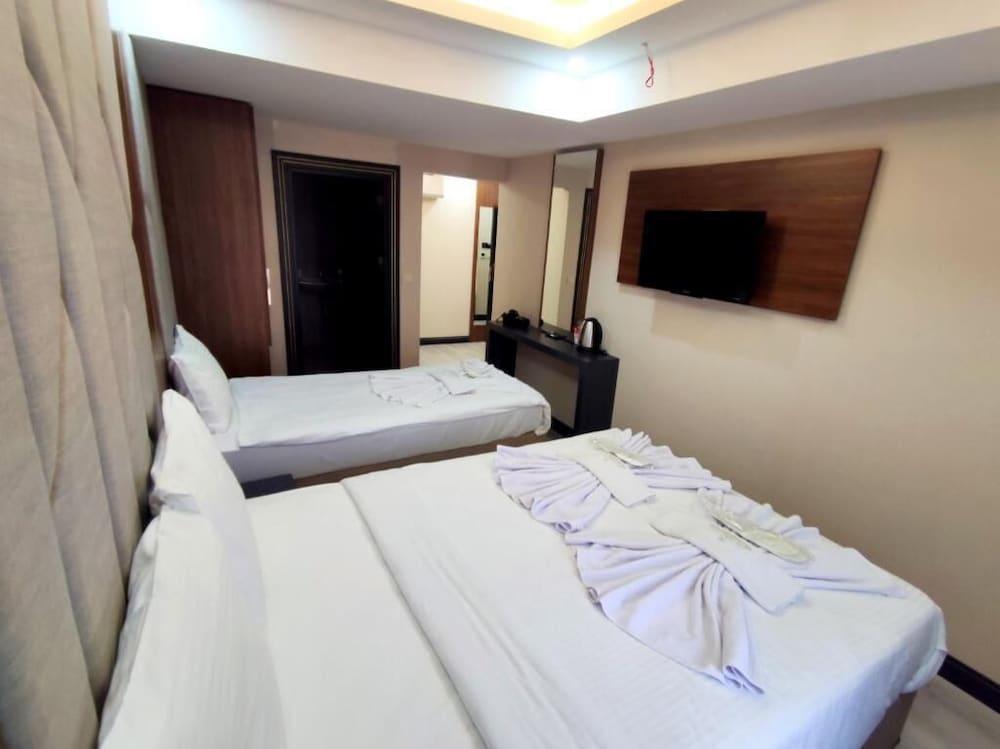 ذا جولدن بيراز هوتل آند سبا غرفة