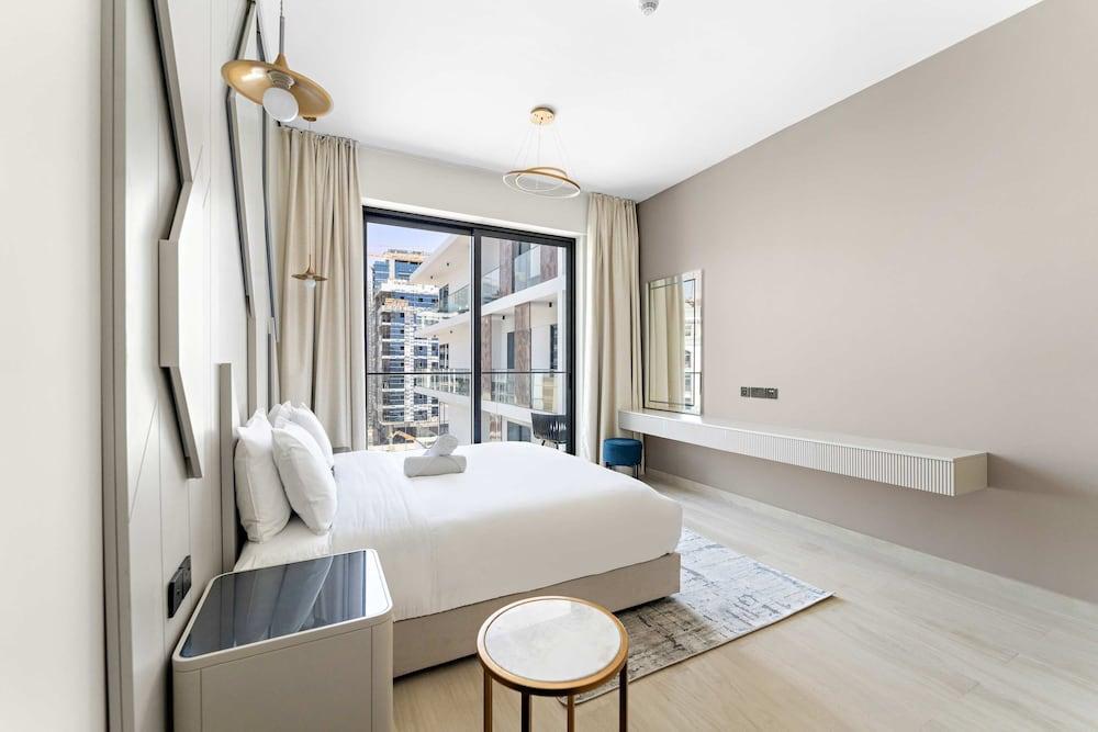 شقة أنيقة بغرفة نوم واحدة في أرجان بها صالة ألعاب رياضية، وغرفة ألعاب، وحمام سباحة غرفة