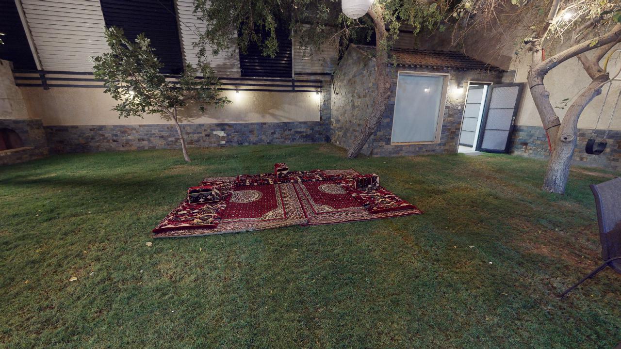 Comfy Istiraha with Pool | 242 Garden Seating Area