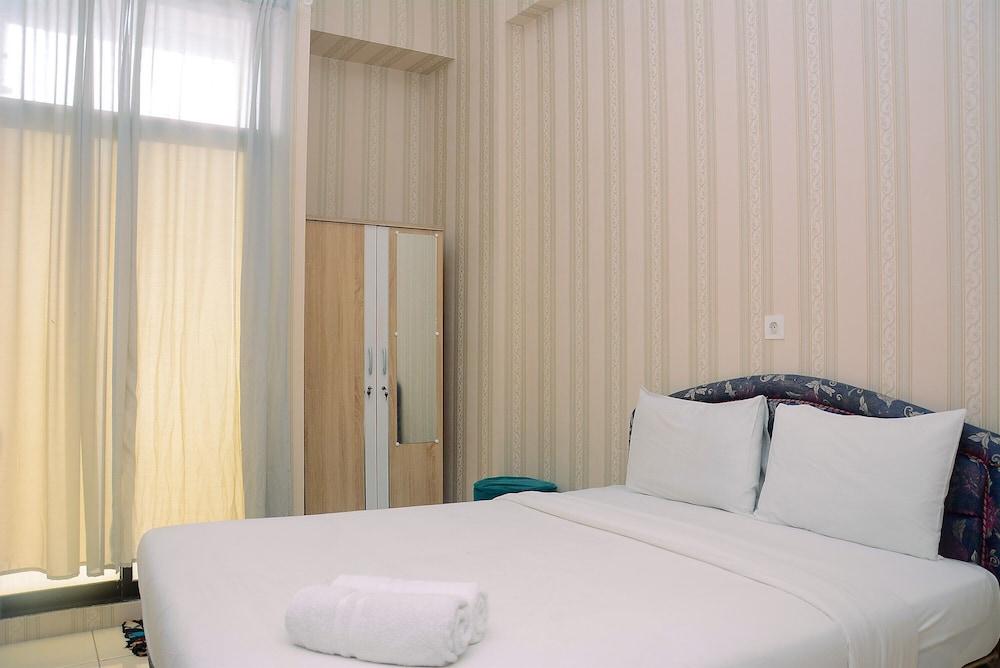 Fully Furnished Studio with Queen Bed at Dave Apartment Featured Image