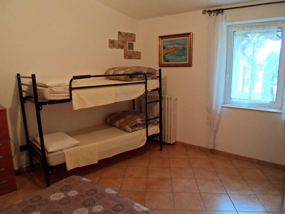 إل فولتو ديل لاجو رومز آند أبارتمنتس غرفة