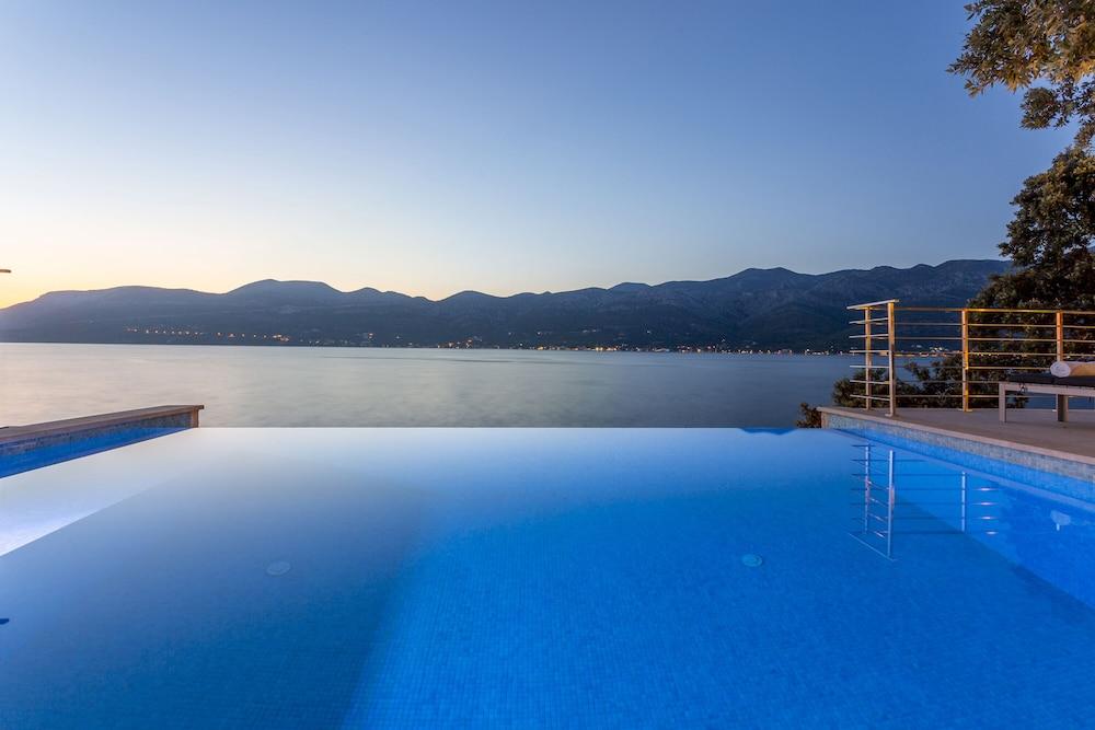 Beachfront Villa Poseidon with Heated Pool Infinity Pool