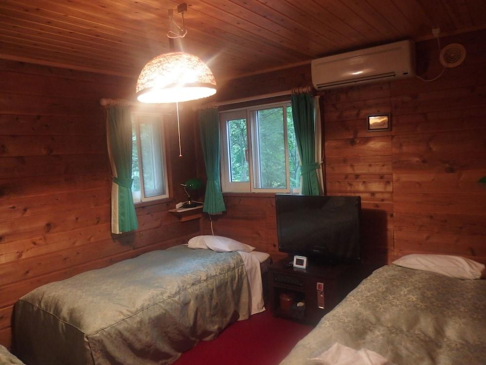 أوراباداي بنسيون يامابيكو غرفة