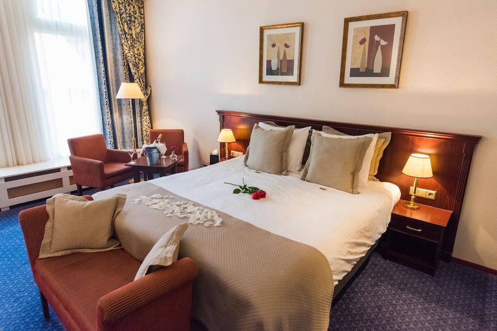 جود سيزونز سيتي سنتر هوتل دين بوش غرفة