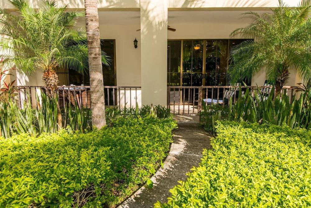 Swank Artsy Ground Floor Unit in Front of the Pool in Playas del Coco Property Grounds