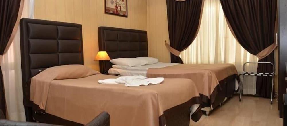 أوميت بيمبي كوسك هوتل غرفة