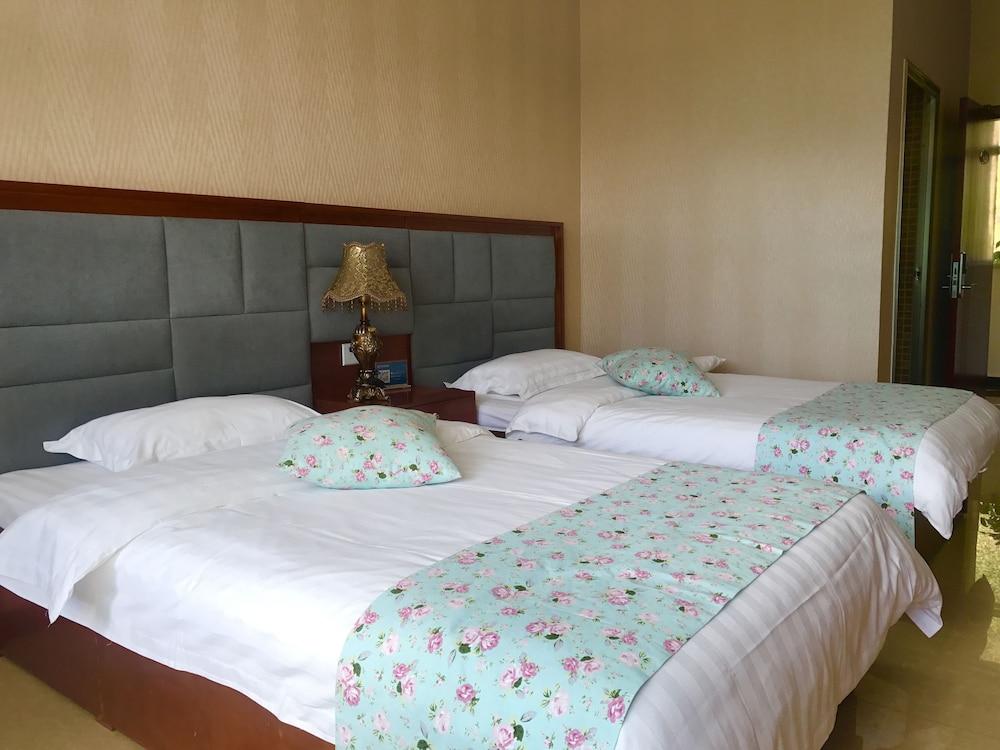 ييجي هوليداي هوتل ييسانبو ليشانتشوانج غرفة