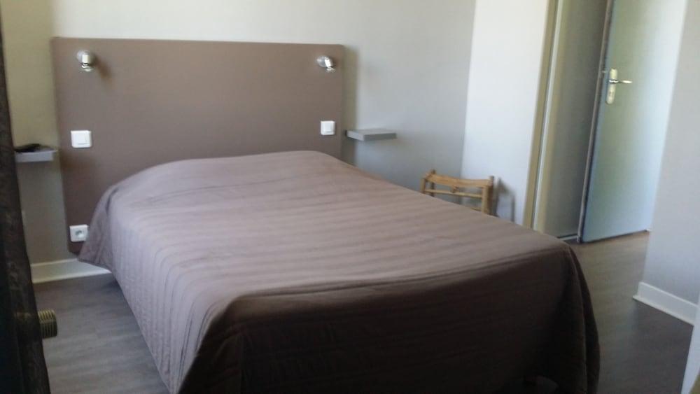 أوبوتشون هوتل غرفة