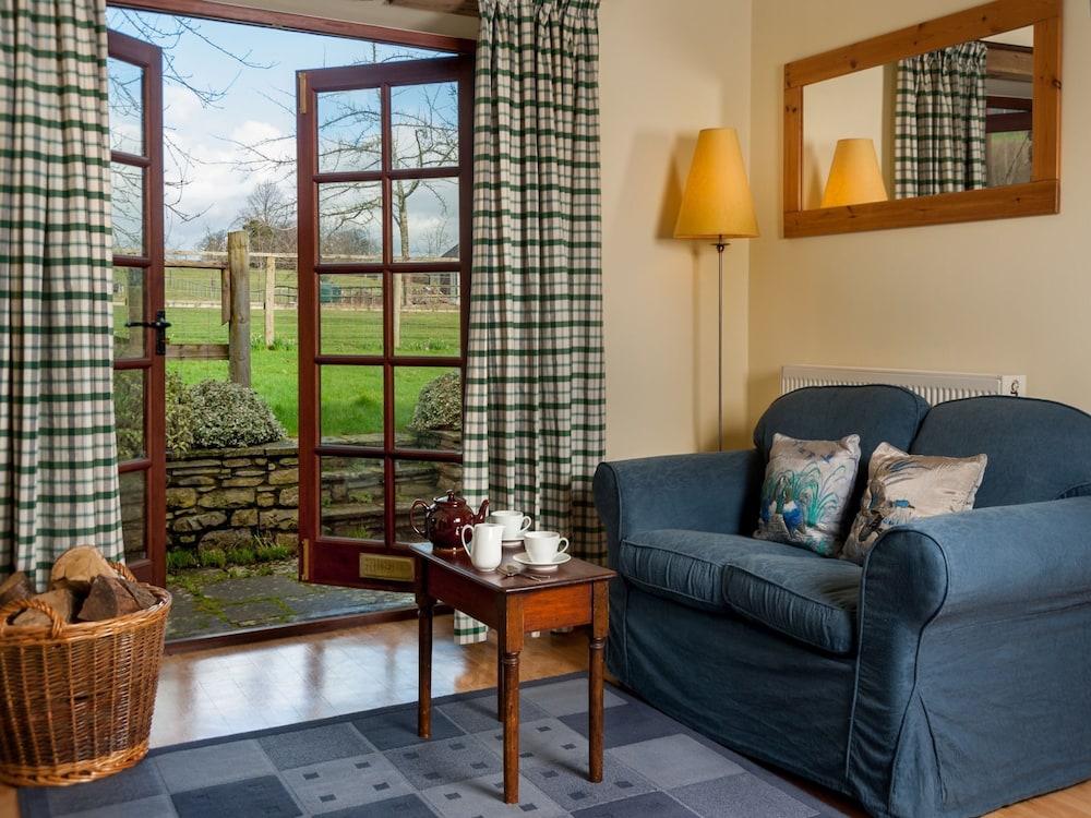 Cottage With Folding-doors in a Calm Environment Surrounded by Farming Fields Living Room