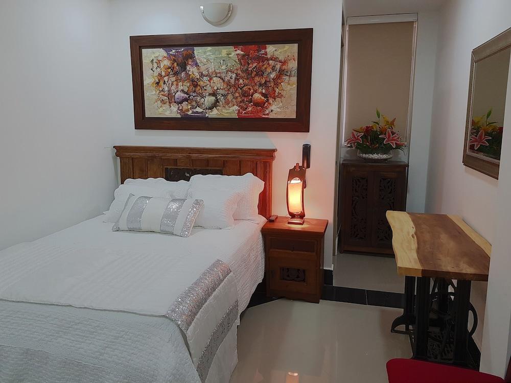 هوتل بوتيك كامباناريو ديل ريو غرفة