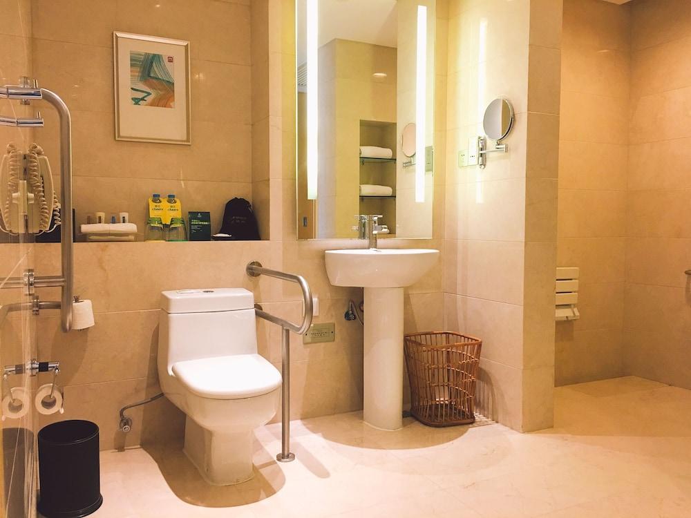 هوليداي إن تايكانغ سيتي س نترب باي آيتش جي حمام