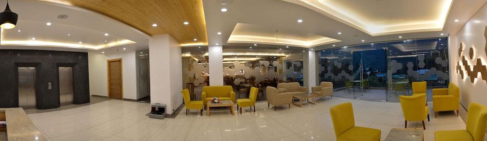 ذا أورشارد جرينز ريزورت - إيه سنترالي هيتيد بروبرتي منطقة الجلوس في الردهة