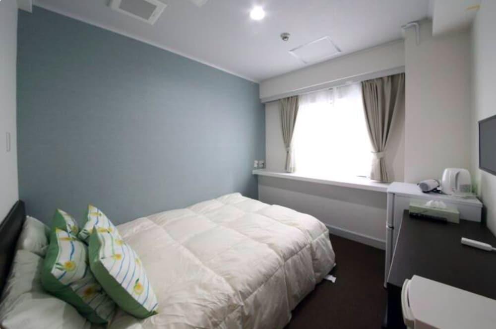 إكسيزون سوجامو