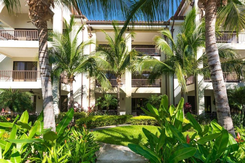 Swank Artsy Ground Floor Unit in Front of the Pool in Playas del Coco Property Grounds