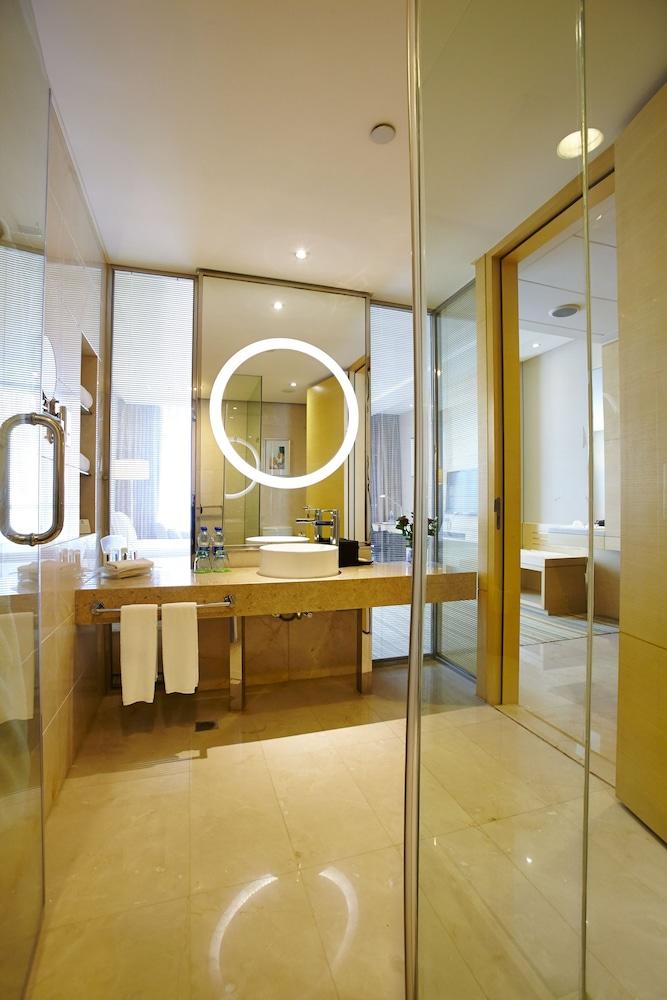 هوليداي إن تايكانغ سيتي س نترب باي آيتش جي حمام