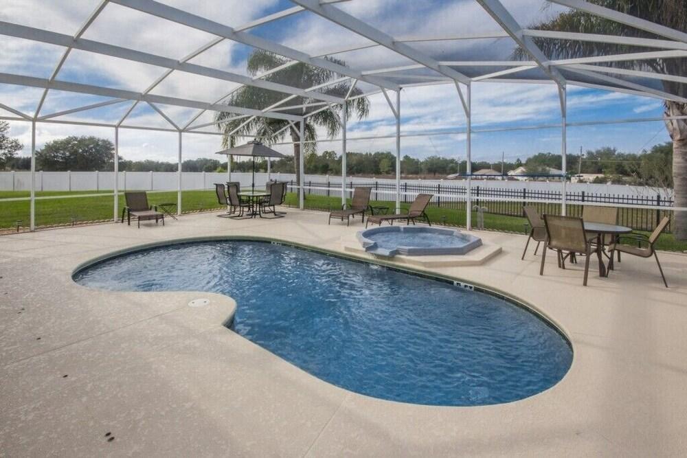 Large Pool Area In Sand Hill Villa 5 Bedroom Home by Redawning