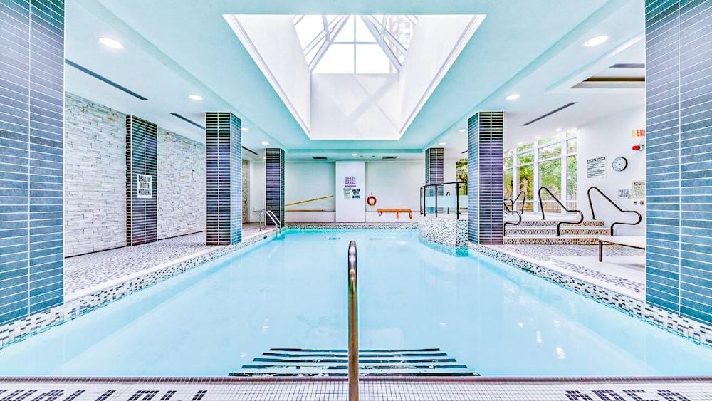 Deluxe Corner Suite - By Elite Suites Indoor Pool