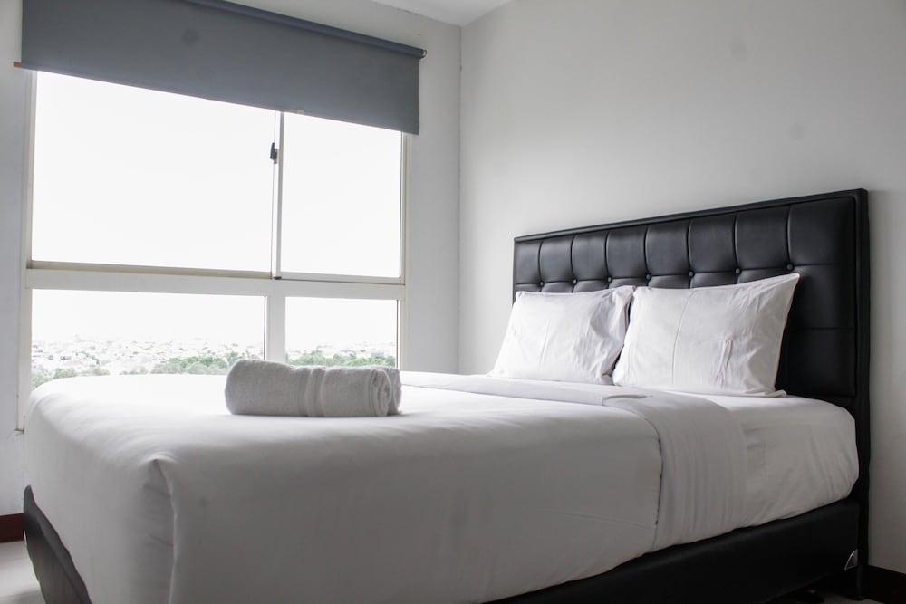 Minimalist and Comfy 1BR Apartment Scientia Residence Room