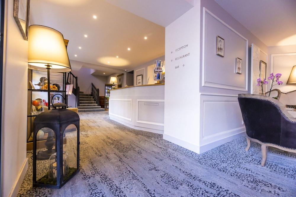 هوتل لو ليون دور إي ريستورانت لا تابل دو ليون منطقة الاستقبال