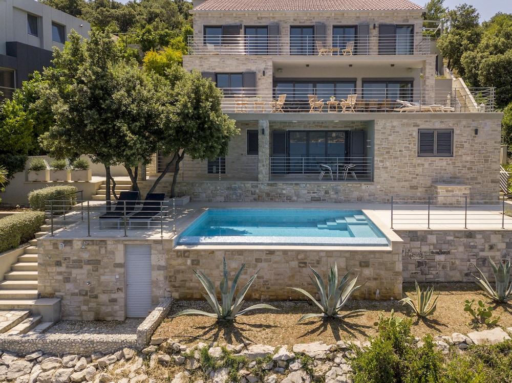 Beachfront Villa Poseidon with Heated Pool Featured Image