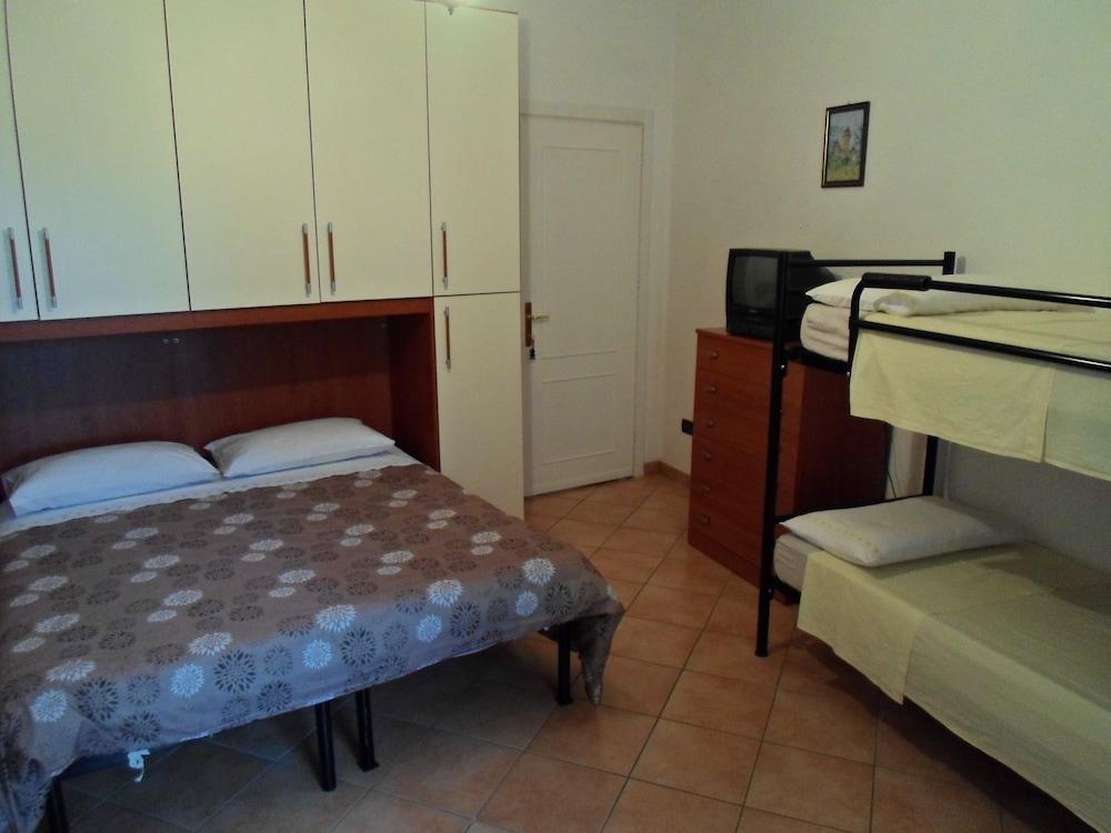 إل فولتو ديل لاجو رومز آند أبارتمنتس غرفة