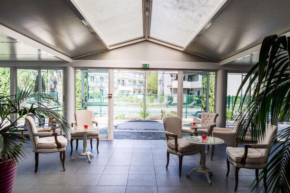 سويل هوتلز دومين دو لا بيتيت أيل منطقة الجلوس في الردهة