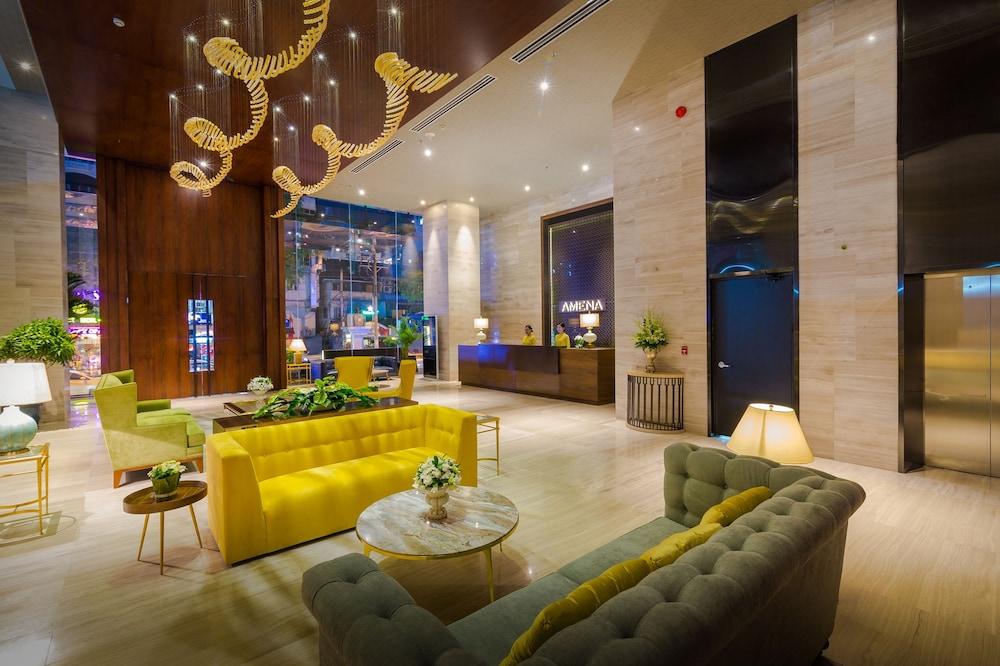 أمينا ريزيدنسيز آند سويتس - مانيدجد باي ميليا منطقة الجلوس في الردهة