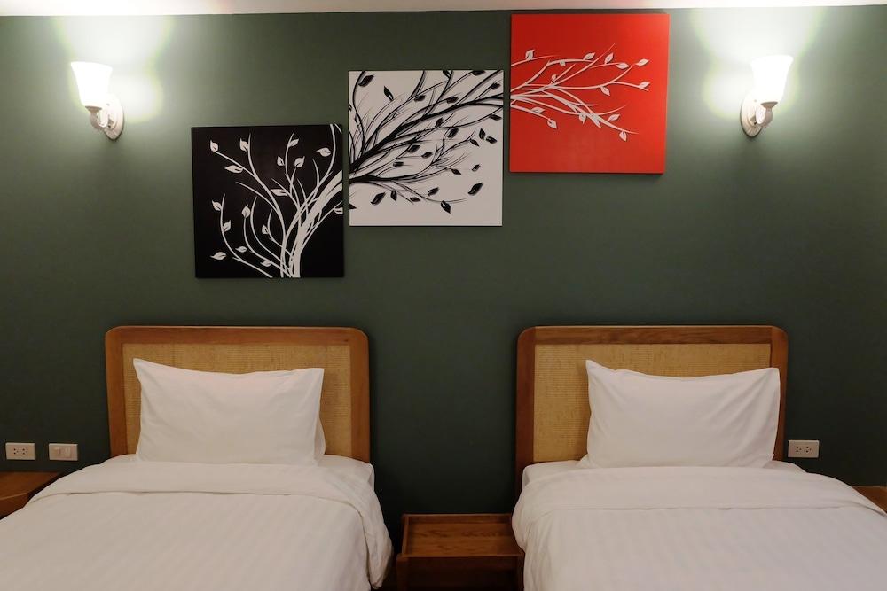 كوزي آت ناين هوتل آند كيتشن غرفة