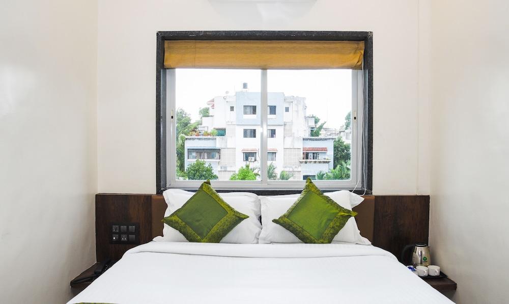 Treebo Malhaar Regency Room