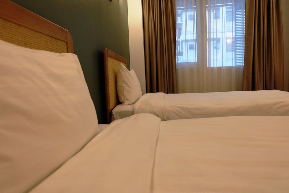 كوزي آت ناين هوتل آند كيتشن غرفة