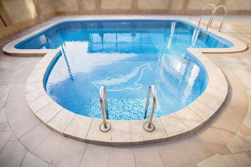 ويند روز هوتل آند سبا حمام سباحة مكشوف