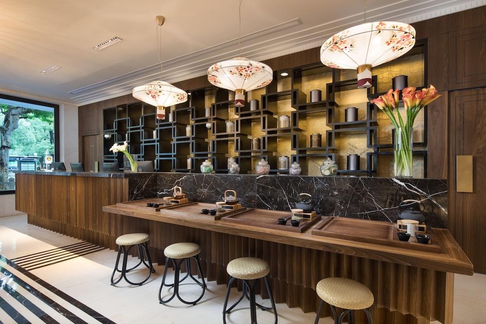 جينجيانغ متروبولو شانجهاي شينتياندي هوتل منطقة الاستقبال