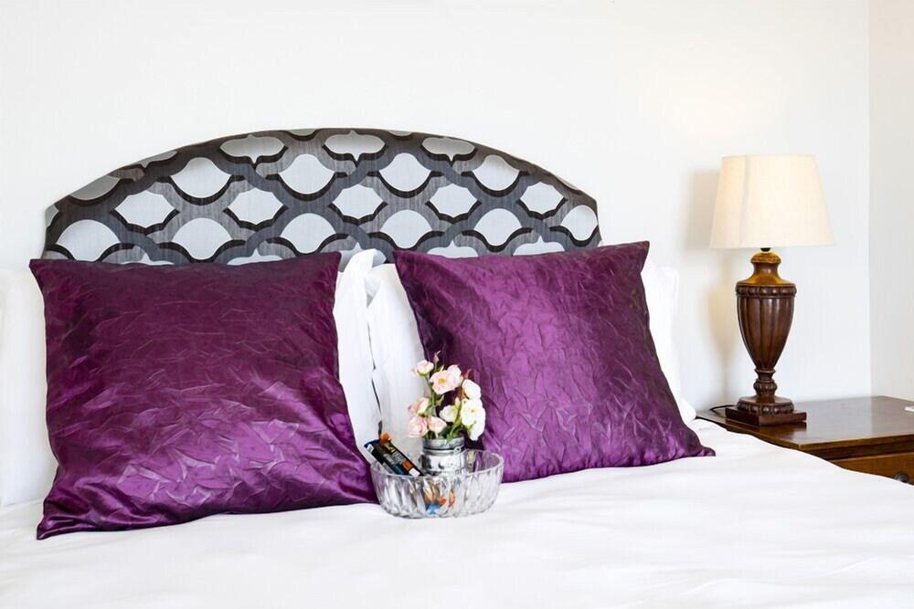 هوليداي جيستهاوس لانجيبان غرفة