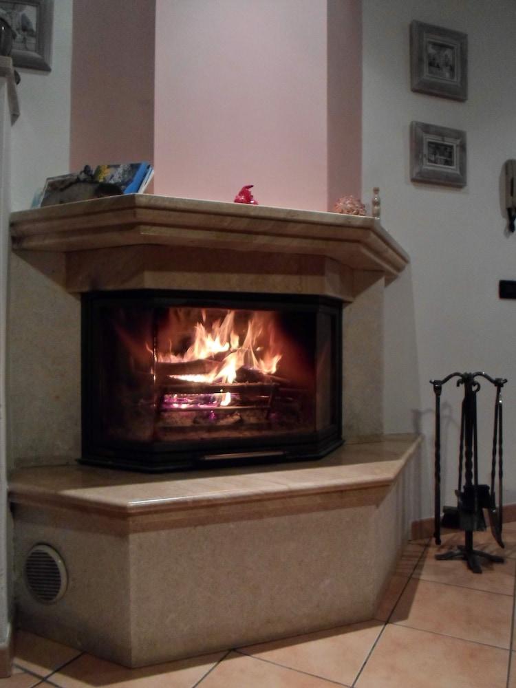 إل فولتو ديل لاجو رومز آند أبارتمنتس منطقة الجلوس في الردهة