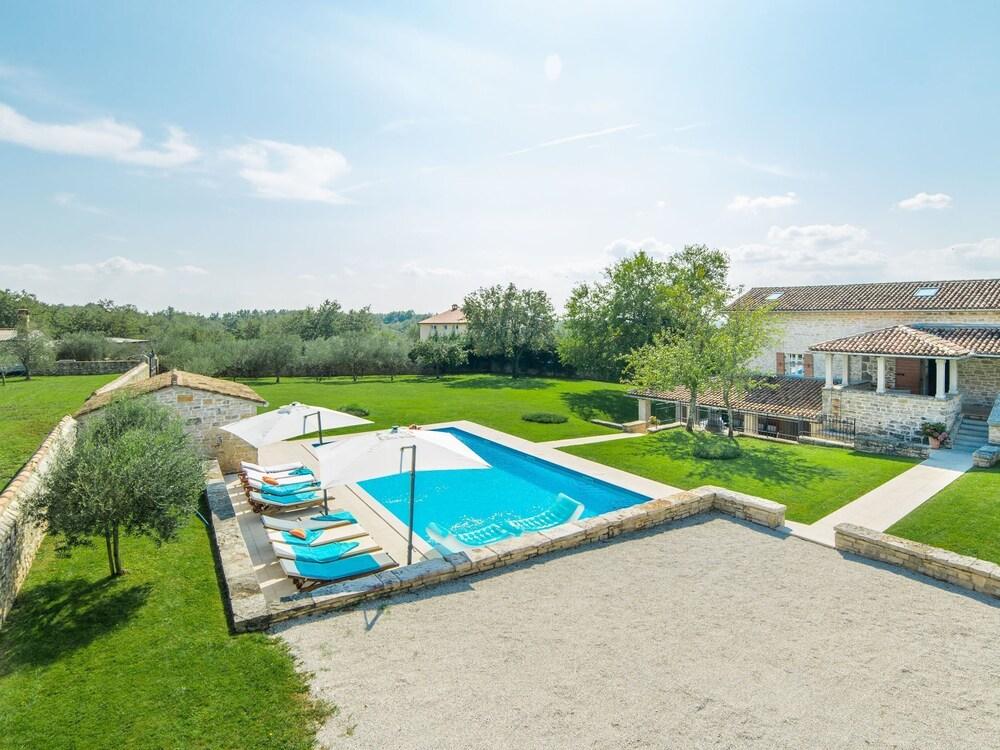 Enchanting Villa With Beautiful Stone Architecture Waterslide