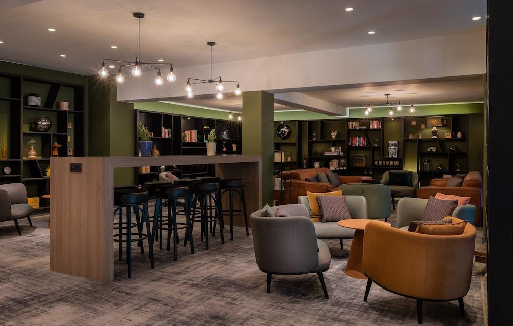 هوليداي إن بروسيلز أيربور  باي آيتش جي منطقة الجلوس في الردهة