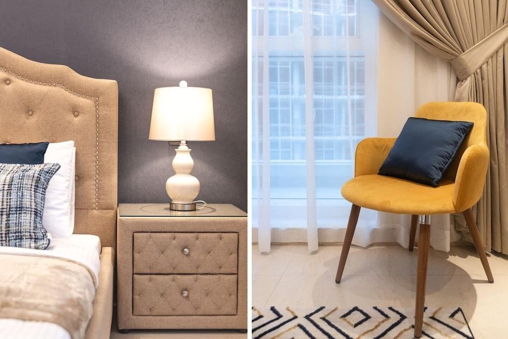 شقة أنيقة وفريدة مكوّنة من غرفتَي نوم في وسط مدينة دبي الراقي! غرفة